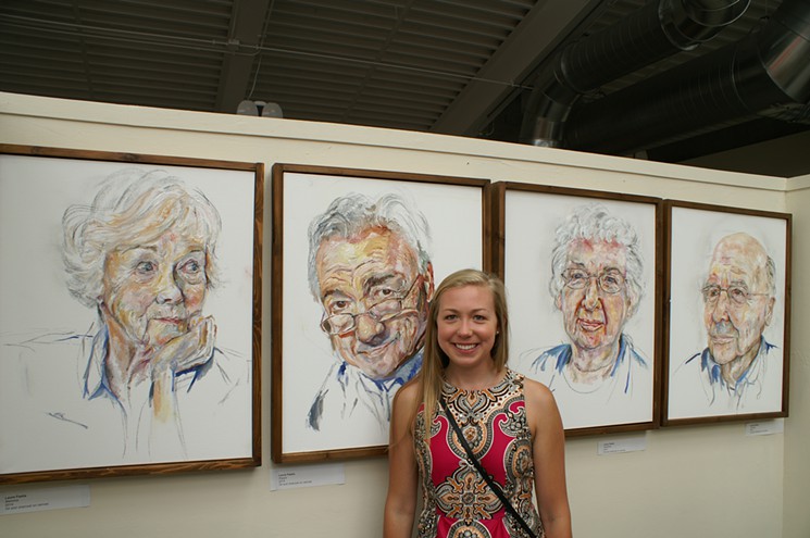 Laura Feehs with some of her work at Steam.