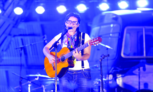 Uruguayan singer Patricia Kramer performs at  the Chaoyang Sports Center for holiday crowds.