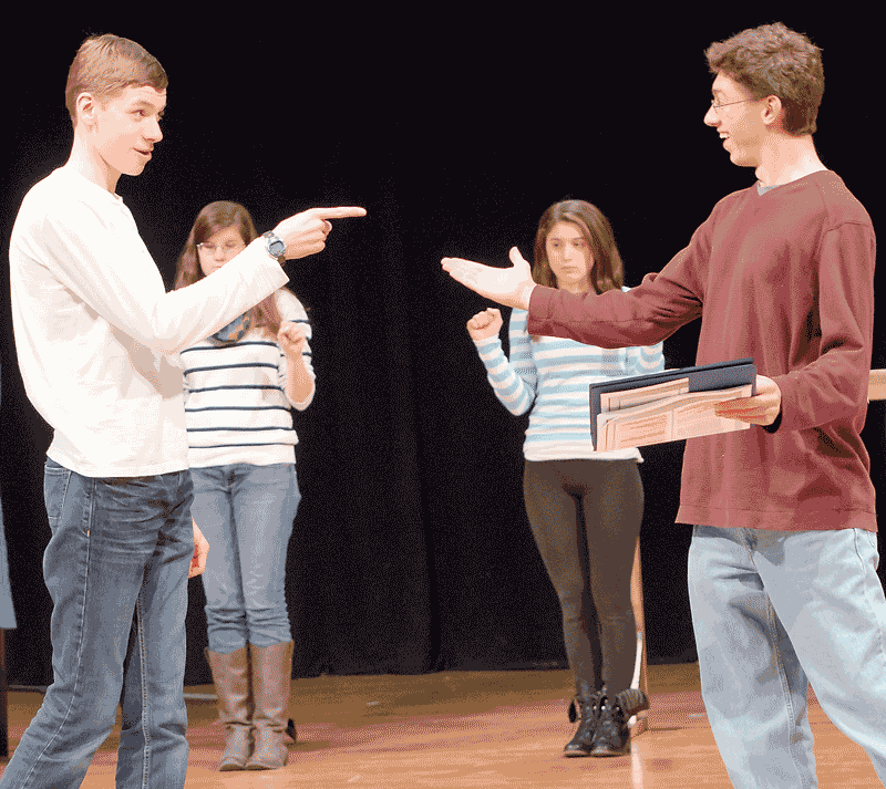 Blake Pritchard, Becky Hermenze, Marisa Gregory, and Austin Jennings rehearse a scene from Still Life with Iris on the stage at Joel Barlow High School. Mark Pritchard photo
